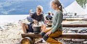 children playing on the beach at Tinnsjøen