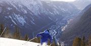 skiing at Gausta ski center with a view down to Rjukan